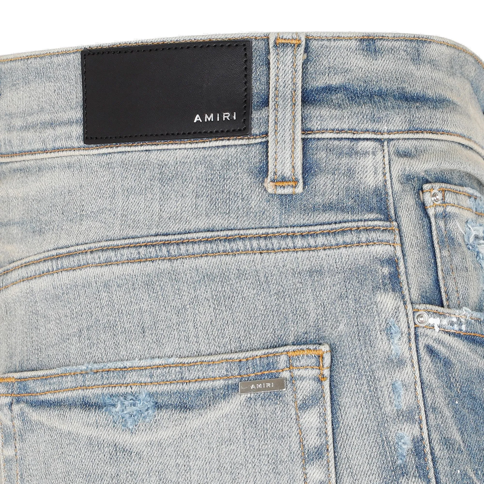 Amiri Faded-Effect Ripped Slim Fit Jeans